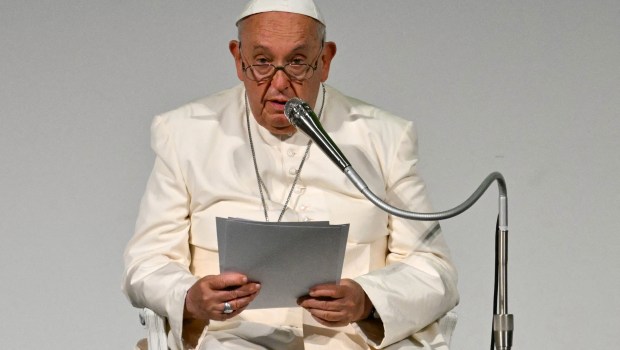 Pope Francis speaks during a pastoral visit on the occasion of the 50th Social Week of Italian Catholics