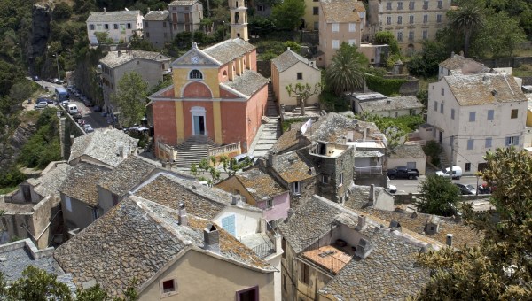The village of Nonza in Corsica with a view of the Church of St. Julie