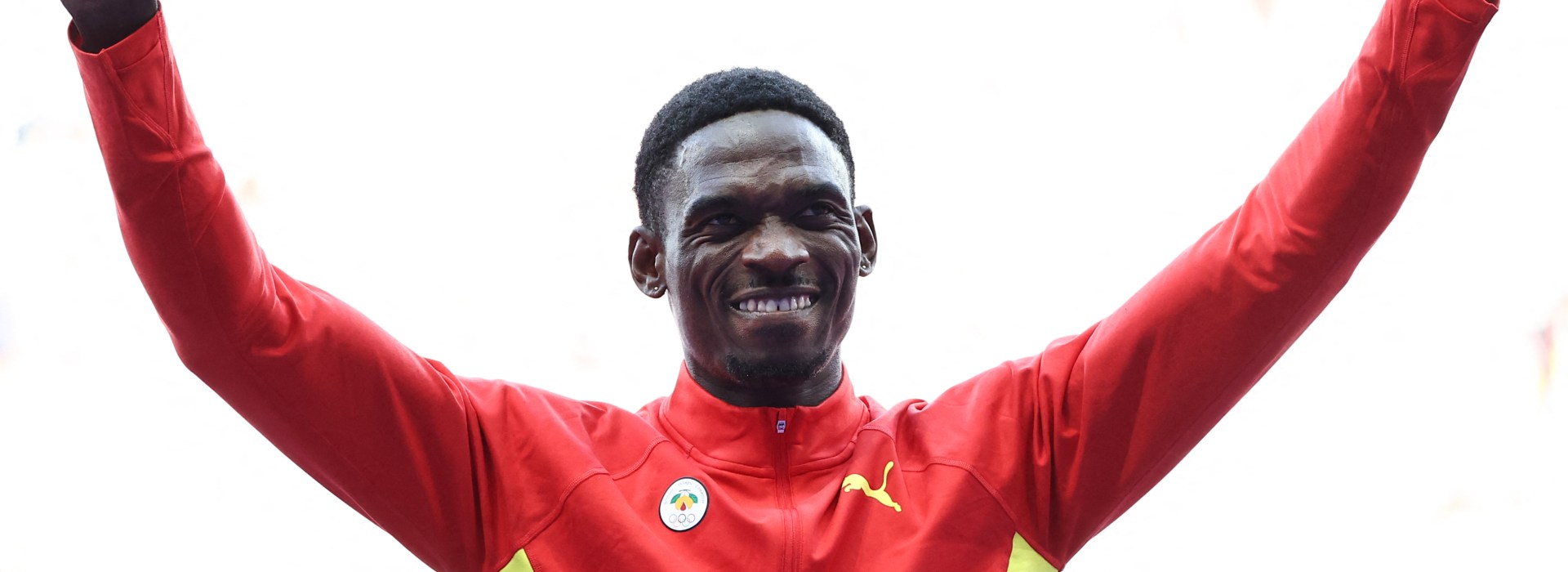Bronze medallist Grenada's Lindon Victor celebrates on the podium during the victory ceremony for the men's decathlon athletics event during the Paris 2024 Olympic Games at Stade de France