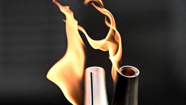 Two Olympic torches in Paris Olympics relay