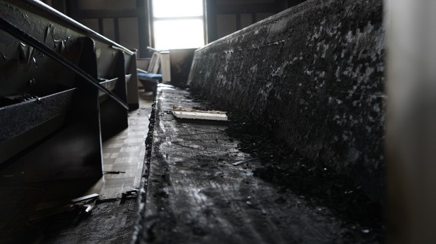burned church pew