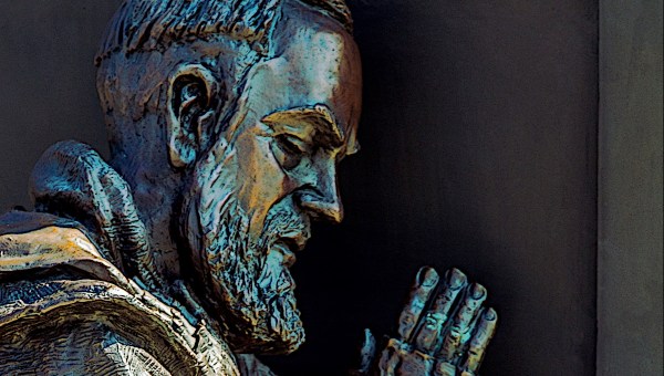 Padre Pio bronze relief close up