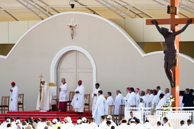 Pope Francis (2nd L) attends holy mass at the Esplanade of Tasitolu in Dili, East Timor, on September 10, 2024.