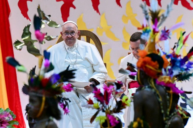 Pope Francis watches performers dance during his visit to Children of Street Ministry and Callan Services at the Caritas Technical Secondary School in Port Moresby on September 7, 2024.
