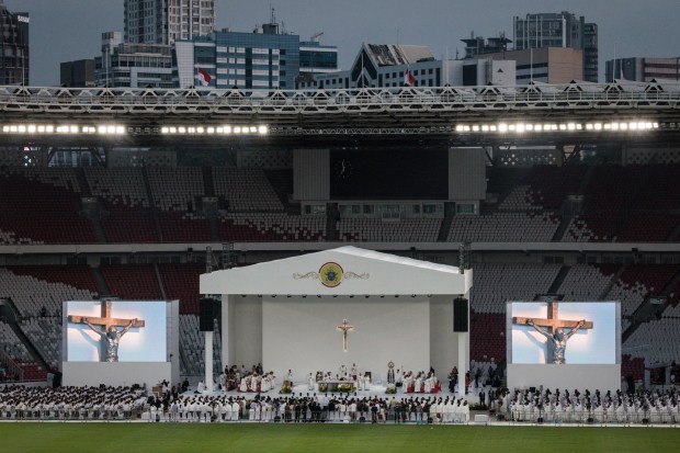 Catholic faithful attend a holy mass led by Pope Francis at the Gelora Bung Karno Stadium in Jakarta on September 5, 2024.