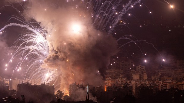 Smoke rises from the site of an Israeli airstrike that targeted a neighborhood in Beirutís southern suburbs late on October 6, 2024