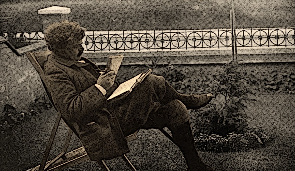 Chesterton at 31 lounging as he works.