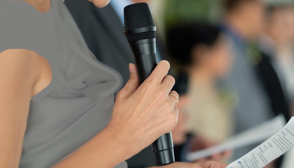 Woman delivering speech no face