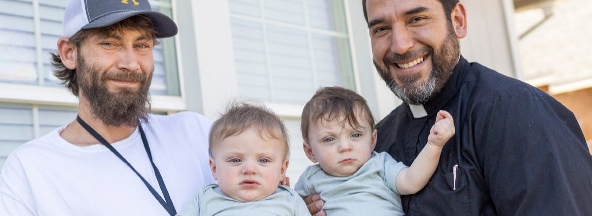 Fr Jesús Mariscal plus twins and father