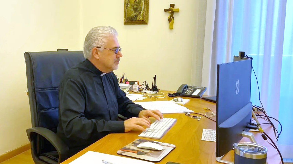 Future cardinal Fr. Fabio Baggio in his office in the Curia