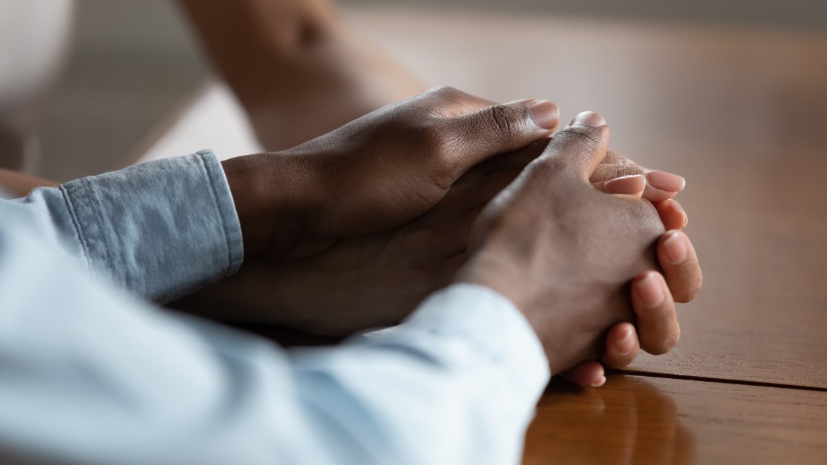 Holding hands in forgiveness