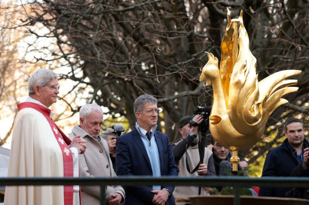 Philippe Villeneuve with golden rooster Notre Dame