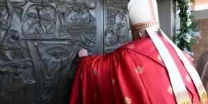 Even if hope hurts, hold on, Pope urges as he opens Holy Door at prison