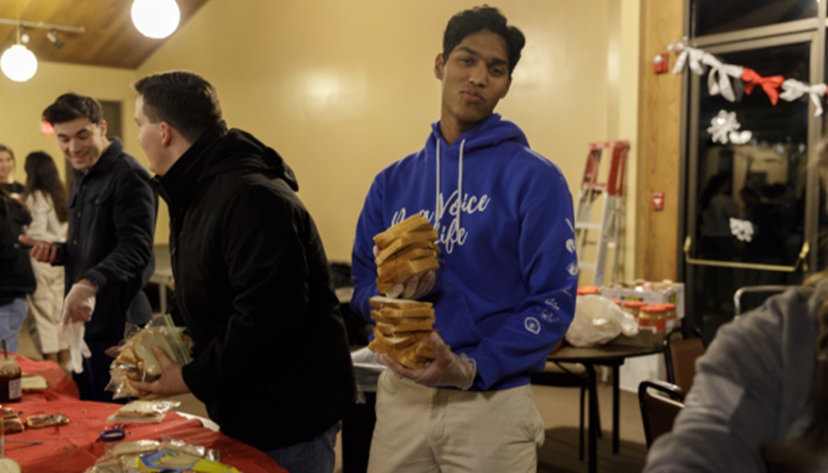 Thomas Aquinas College students making sandwiches