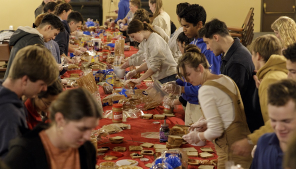 Thomas Aquinas College students making sandwiches