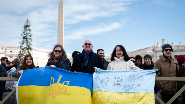 Faithful from Ukraine during the Urbi et Orbi blessing of Pope Francis as part of Christmas celebrations, at St Peter's square in the Vatican on December 25, 2024.