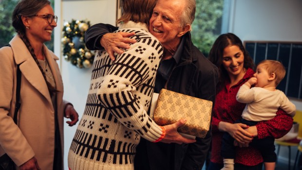 guests entering house for Christmas