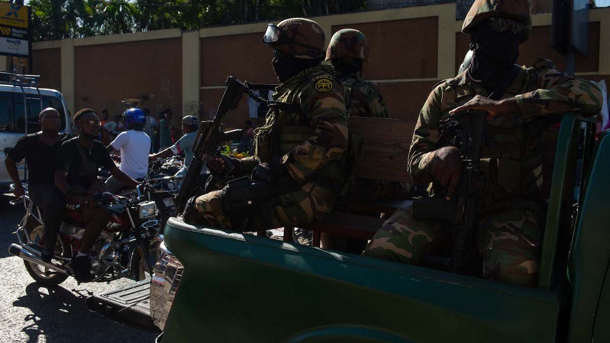 Haitian armed forces patrol Port-au-Prince suburb