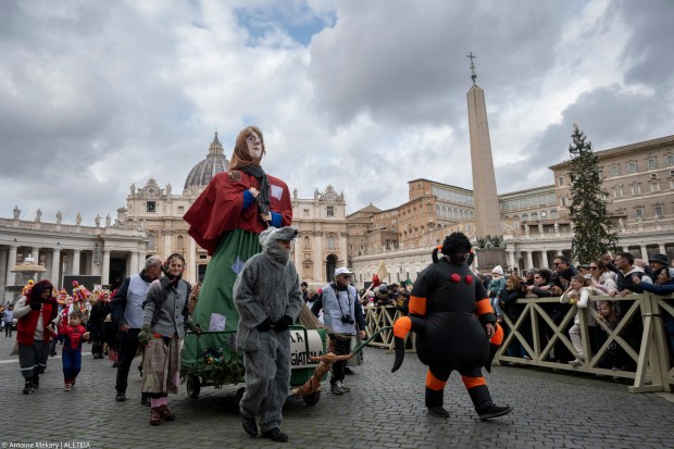 Pope Francis delivers his blessing during the Angelus prayer in St.Peter's Square at the Vatican on January 6, 2025