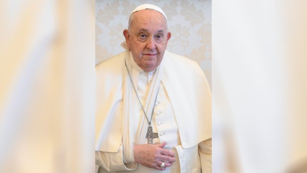 Pope Francis with his right arm bandaged and immobilized due to a fall this morning