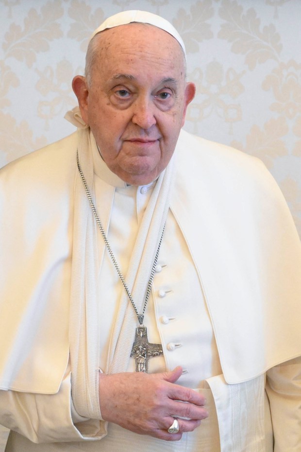 Pope Francis with his right arm bandaged and immobilized due to a fall this morning