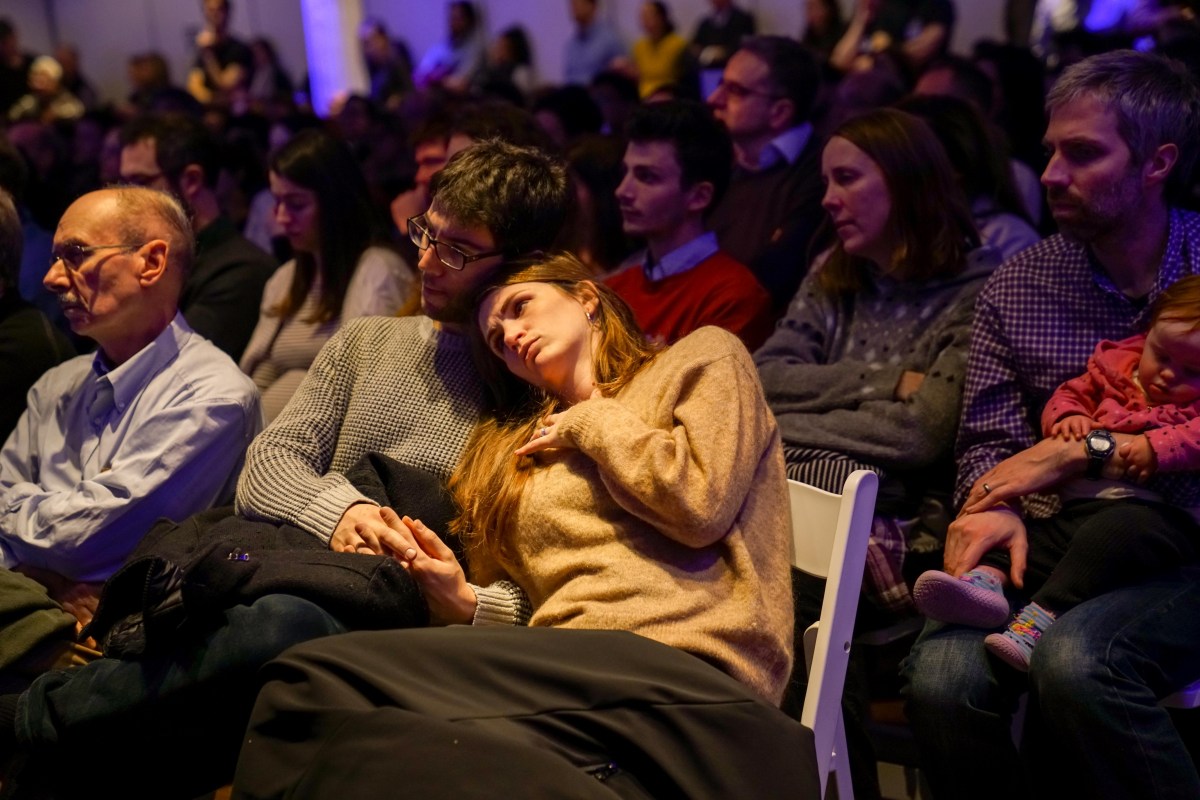 Attendees listen to a performance at the New York Encounter