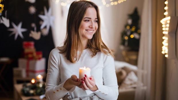 woman Christmas candle