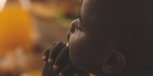 Viral video of grandson praying like his grandma is glorious!