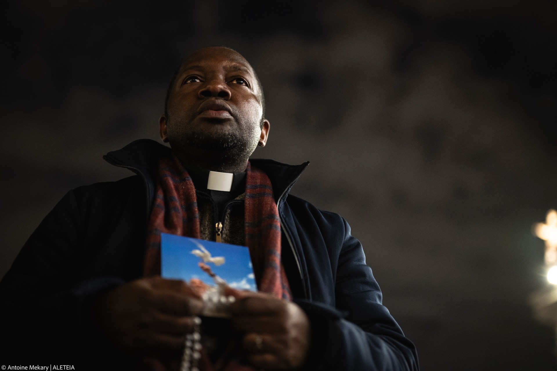 Priest pray the rosary in St. Peter's Square at The Vatican, Friday, Mar. 14, 2025