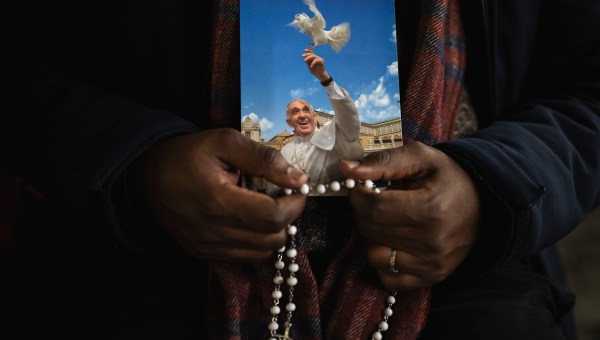 Priest pray the rosary in St. Peter's Square at The Vatican, Friday, Mar. 14, 2025