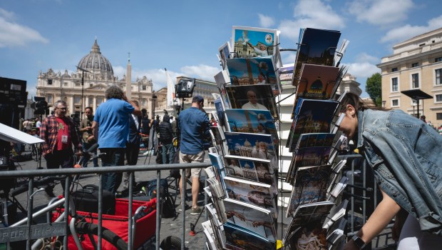 A postcard showing Pope Francis is displayed at a souvenirs shop by St. Peter's Square in the Vatican on April 23, 2025.