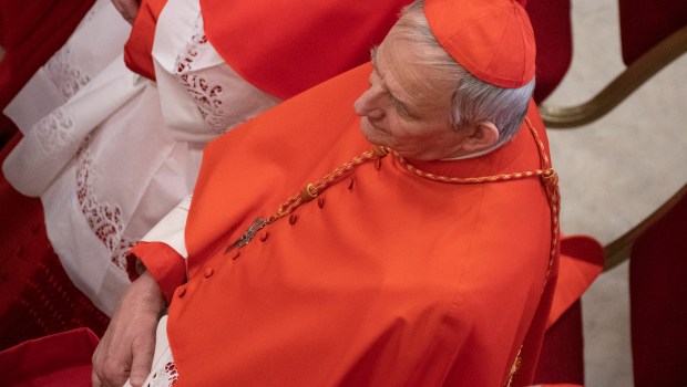 cardinals paying their respects and walking next to the coffin of late Pope Francis at the St Peter's Basilica, during a ceremony following the procession of the late Pope's coffin from the chapel of Santa Marta to St Peter's Basilica in The Vatican
