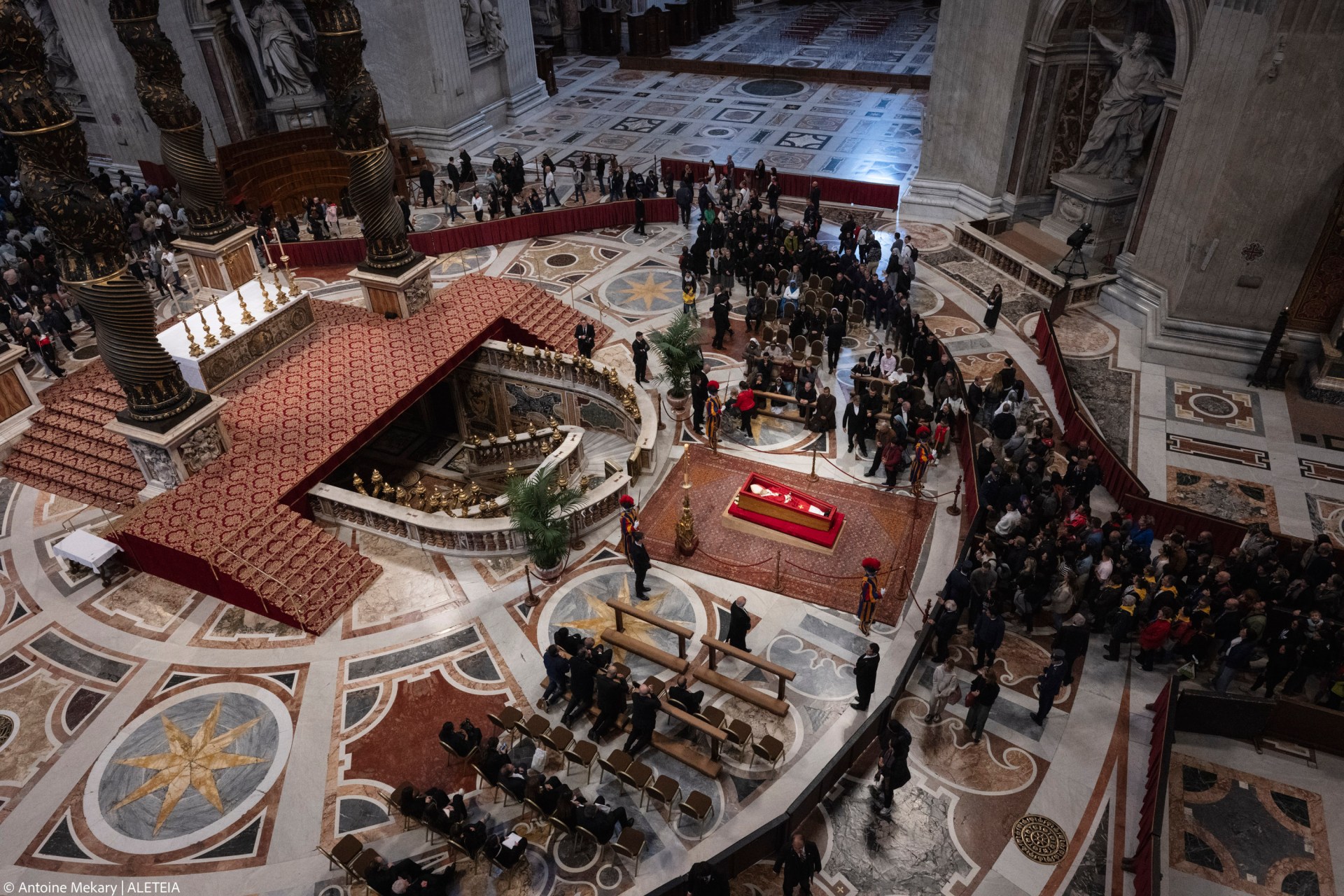 People queue at St Peter's Basilica to pay their respects to late Pope Francis as he lies in state in The Vatican