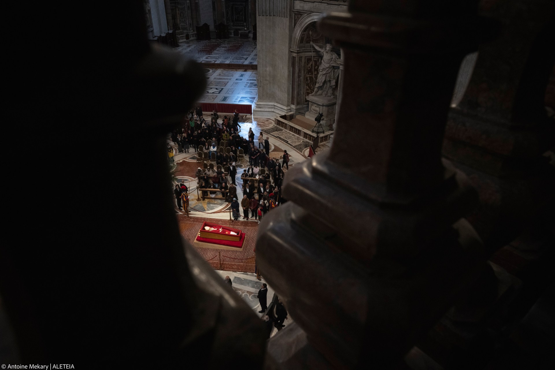 People queue at St Peter's Basilica to pay their respects to late Pope Francis as he lies in state in The Vatican