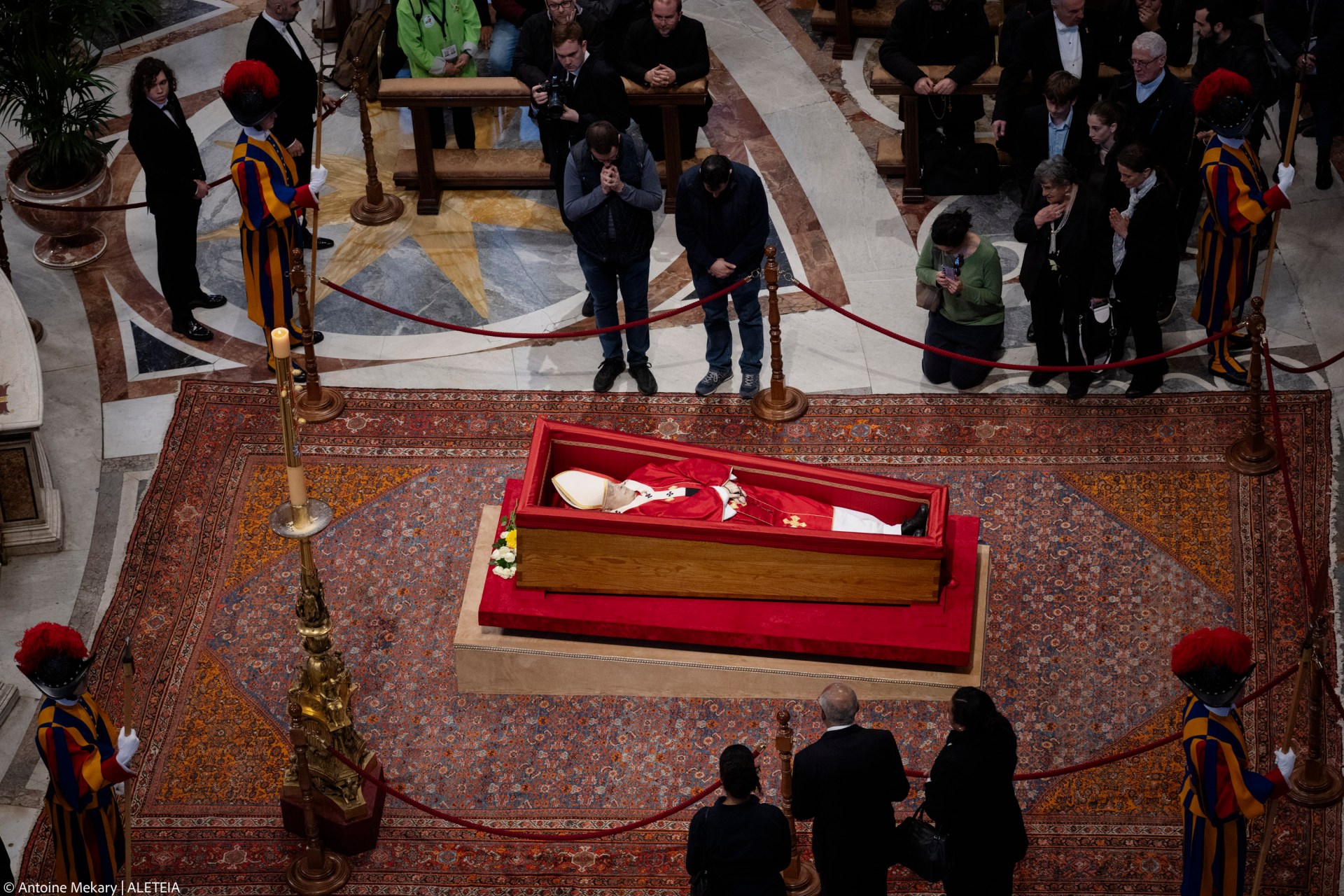 People pay their respects to late Pope Francis as he lies in state at St Peter's Basilica in The Vatican, on April 24, 2025.