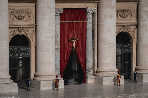 Swiss Guards stand in St. Peter’s Square during preparations for the arrival of the late Pope’s coffin