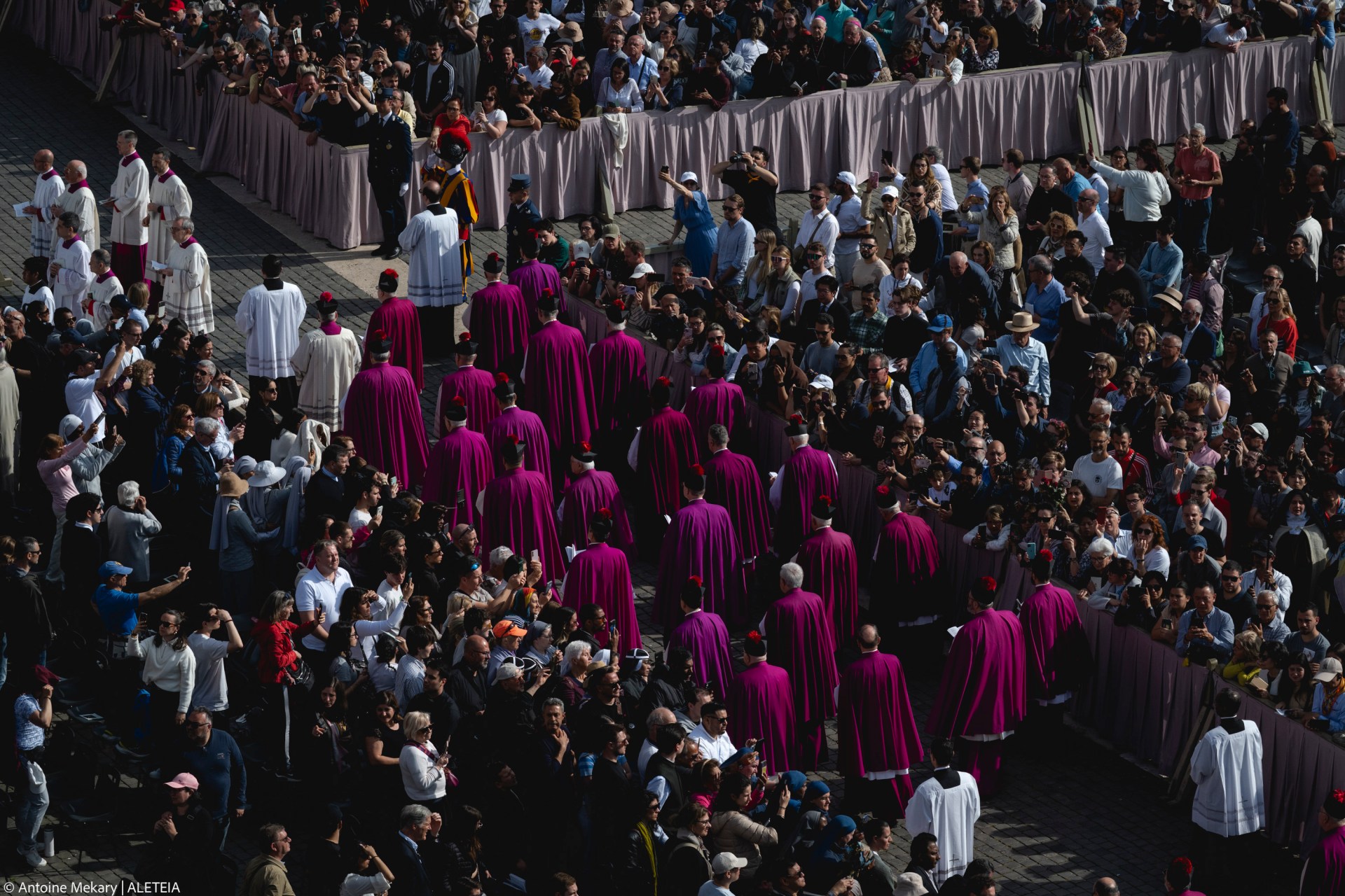 Swiss Guards stand in St. Peter’s Square during preparations for the arrival of the late Pope’s coffin