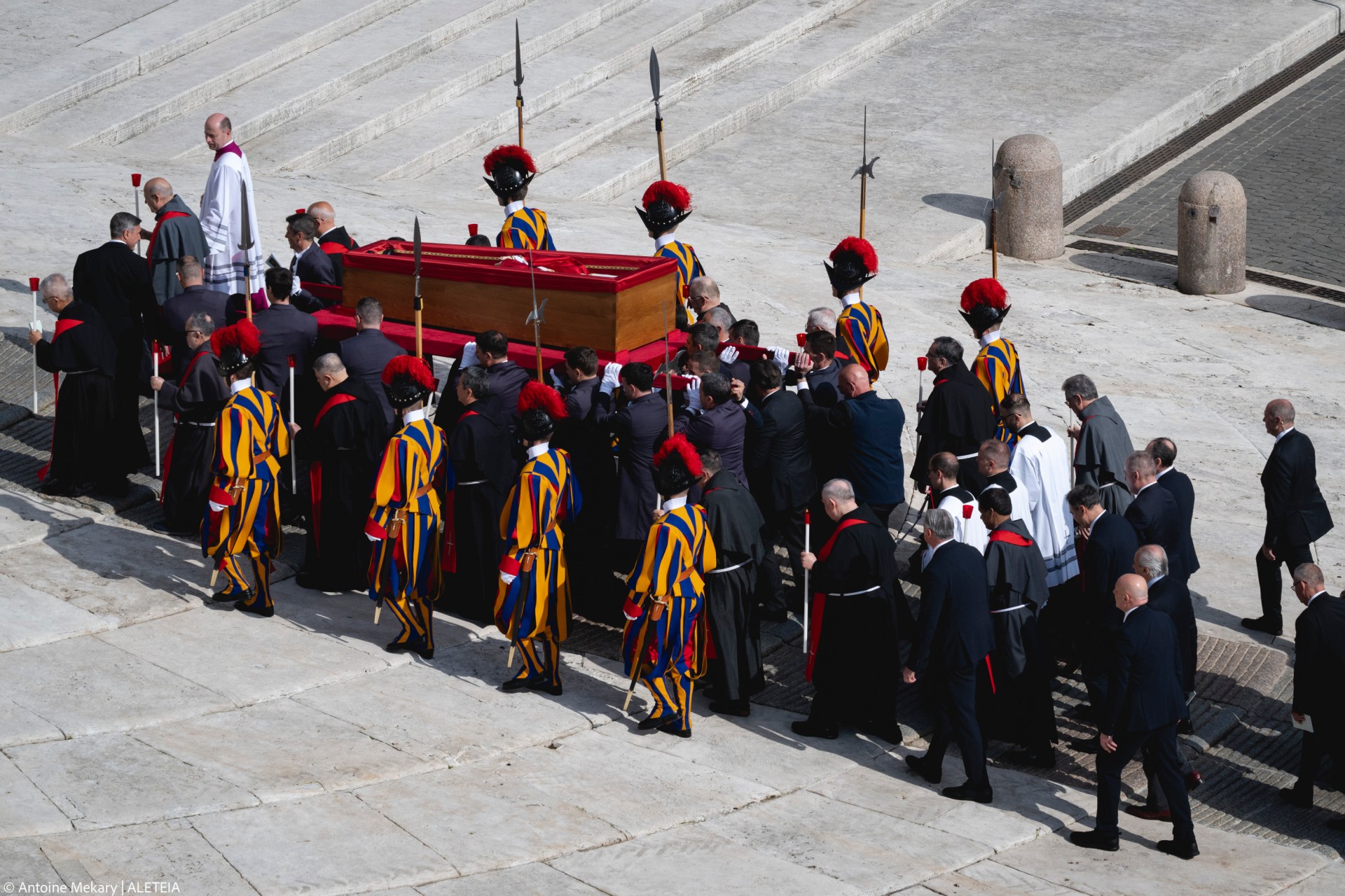 Pallbearers carry the coffin of the late Pope from the chapel of Santa Marta to St. Peter's Basilica in the Vatican on April 23, 2025.