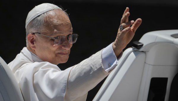 Pope Leo XIV waves to the crowd as he leaves on a popemobile after the weekly general audience at St Peter's Square at The Vatican, on May 28, 2025
