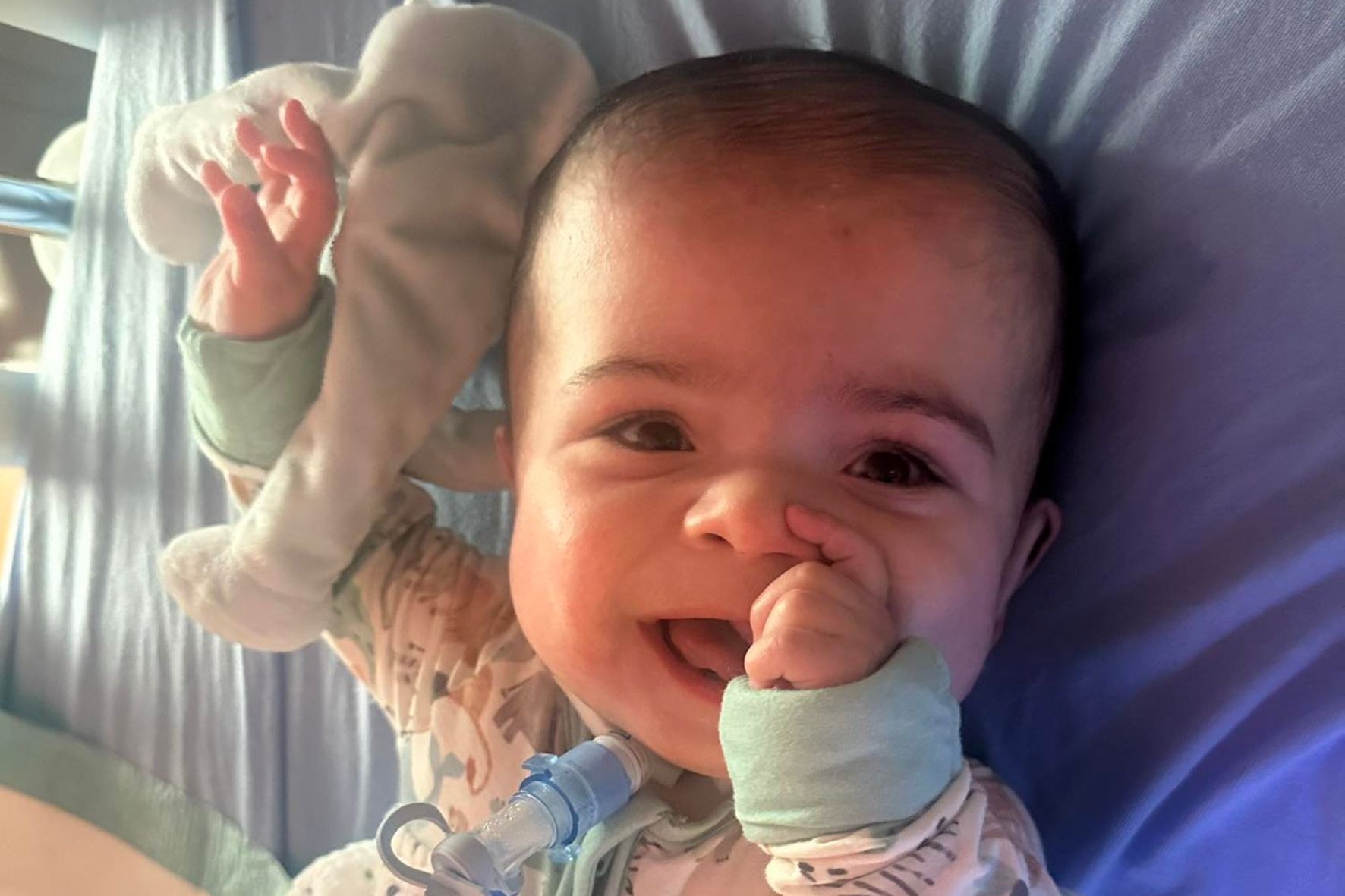 Baby sucking thumb.