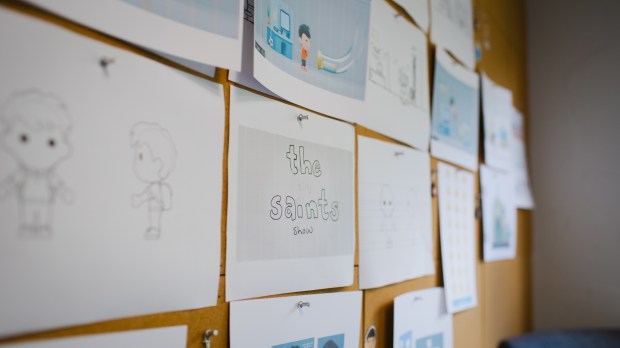 Tiny Saints Show bulletin board.