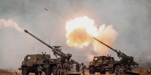 What does the Catechism say about the concept of a “just war”?