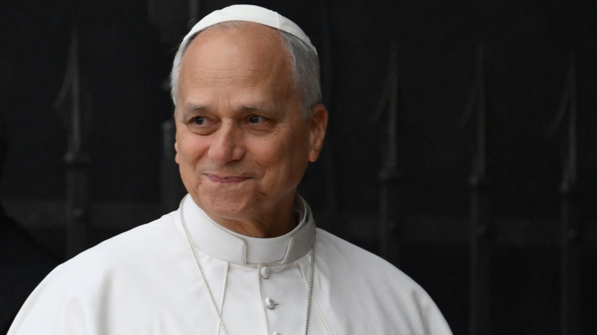 pope-small-smile-black-background.jpg