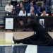 Watch: Priest brings down the house with dance at basketball game