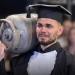 Graduate carries gas cylinder to honor his dad’s sacrifices