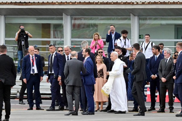 Pope Leo XIV walks to embark a new aircraft offered by Spanish King Felipe VI
