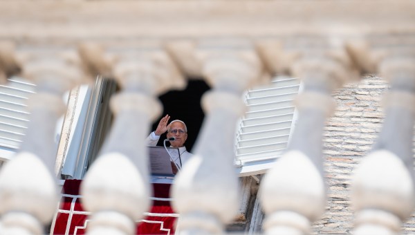 Pope Leo XIV blesses the crowd from a window of the apostolic palace overlooking St Peter's Square during the Angelus prayer in The Vatican on June 21, 2026.
