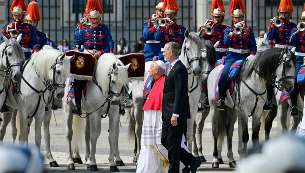 Spain's Felipe VI and Pope Leo XIV review the horse guard at the Royal Palace in Madrid on June 6, 2026