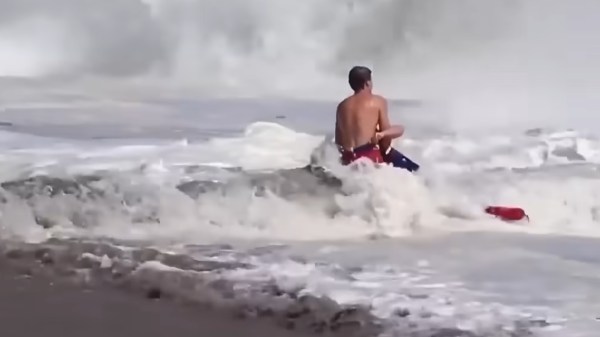 Teen lifeguard rescue