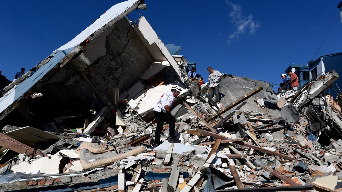 Rescuers look for survivors amid the rubble of a collapsed building after an earthquake in Pereira, Colombia on August 10, 2026. A powerful earthquake rocked Colombia and neighboring Latin American countries on August 10, 2026, with medical teams rushing to help victims after buildings were damaged or collapsed in several cities. The Colombian geological service and its American counterpart USGS put the magnitude at 7.4, with an epicenter 100 km (60 miles) underground in the west of the country. Colombia had initially put it at 6.6.
